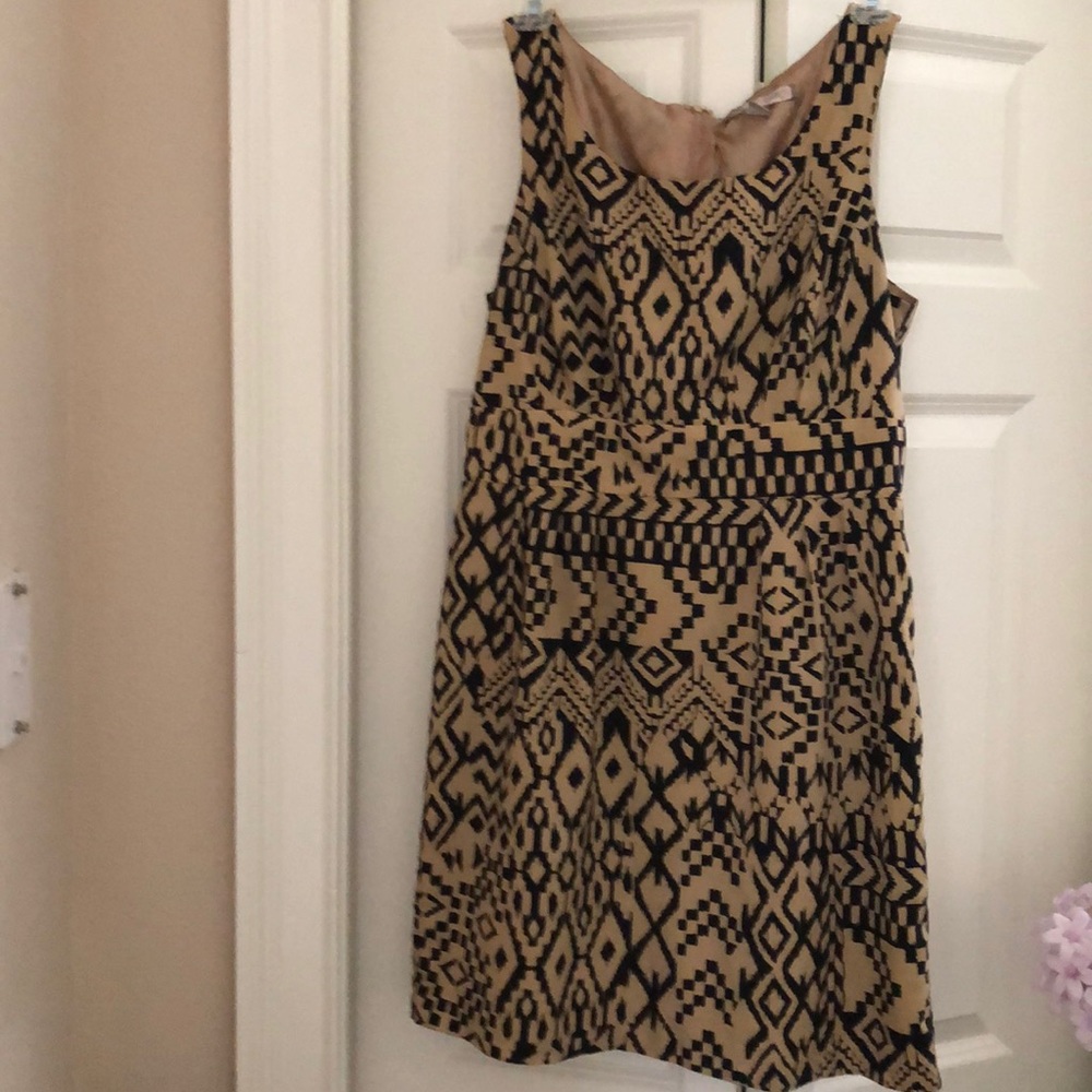 Dress. Light brown and black print.